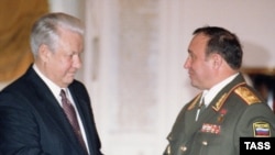 Russian President Boris Yeltsin (left) meets with Defense Minister Pavel Grachev in the Kremlin in February 1996.