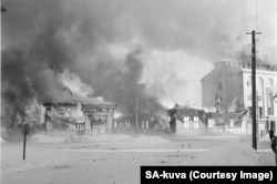 A town in southern Finland burns after a Soviet air attack.