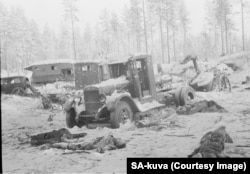 Dead Soviet soldiers and vehicles riddled with bullet holes in February 1940.