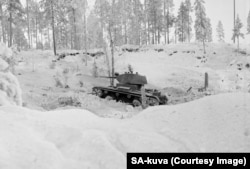 A Red Army tank rolls in Finland. The underequipped Finns initially struggled to counter the Soviets