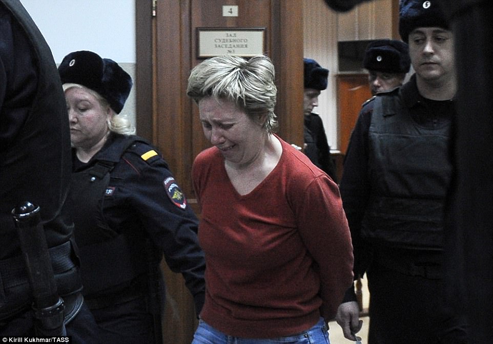 Nadezhda Suddenok, manager of the Winter Cherry shopping centre, weeps as she appears before Kemerovo