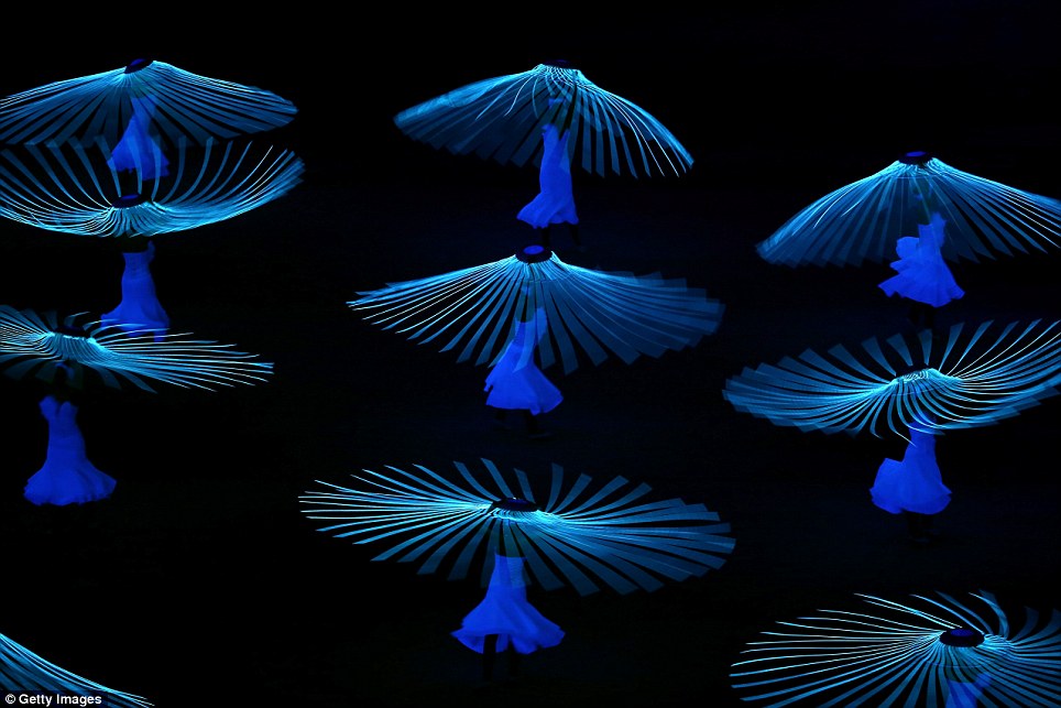Easy on the eye: Dancers perform Dove of Peace as part of the imaginative opening ceremony
