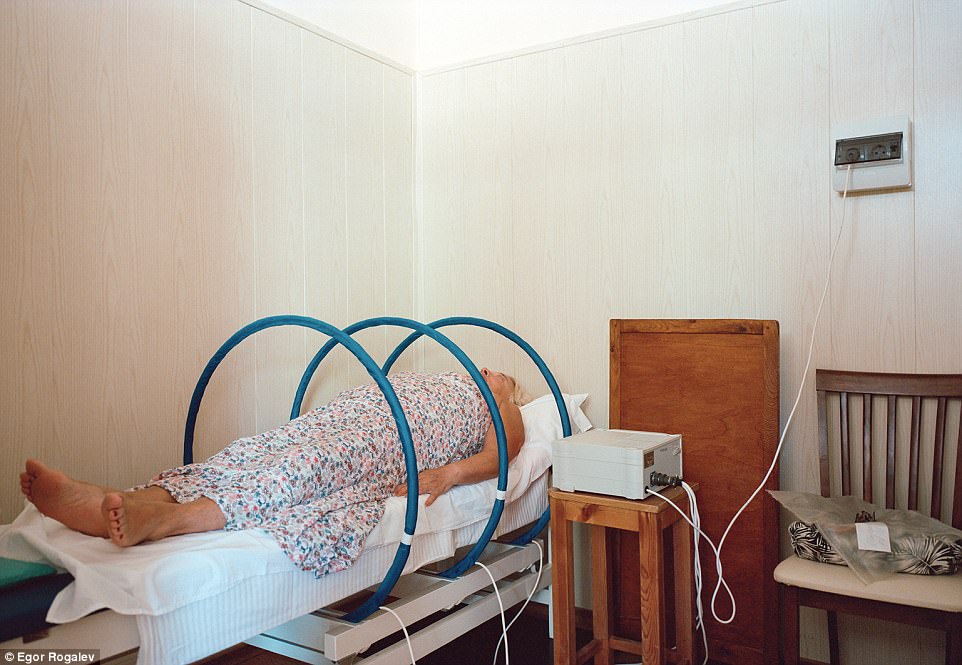 Force for good: A female guest undergoes a form of bizarre-looking magnetic therapy at a sanatorium in Belarus