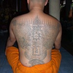 Ajarn Spencer Littlewood gets Yant Gao Yord from Luang Pi Pant at Wat Bang Pra in 1997